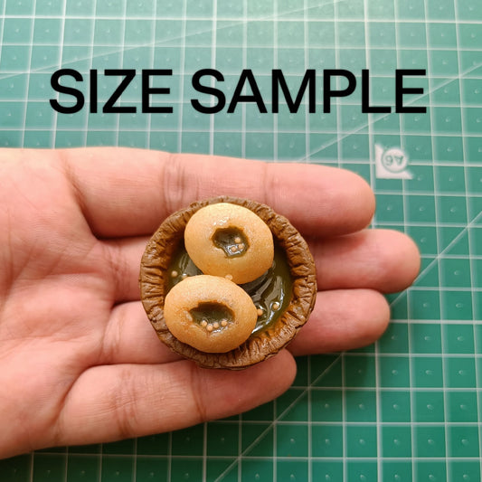 Momos fridge magnet